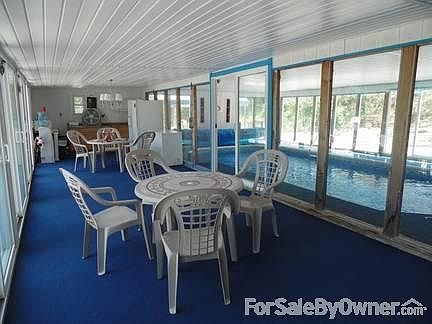 Pool house overlooking the lake
