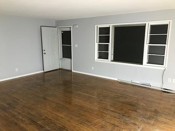 Huge living room with ceiling fan and dimmable lighting