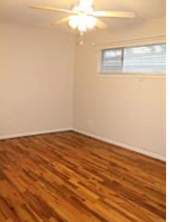 Primary room. Wood floors throughout. Rooms have ceiling fans