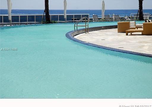 Heated wraparound lap swimming pool