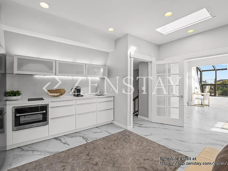 Top level suite with bathroom and small kitchen
