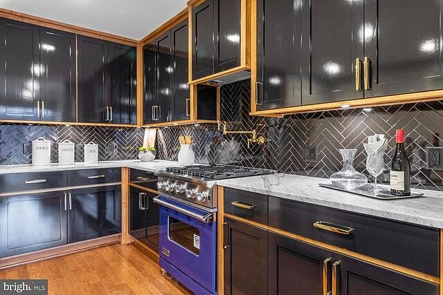 Custom designed and built cabinetry, Viking Professional gas range