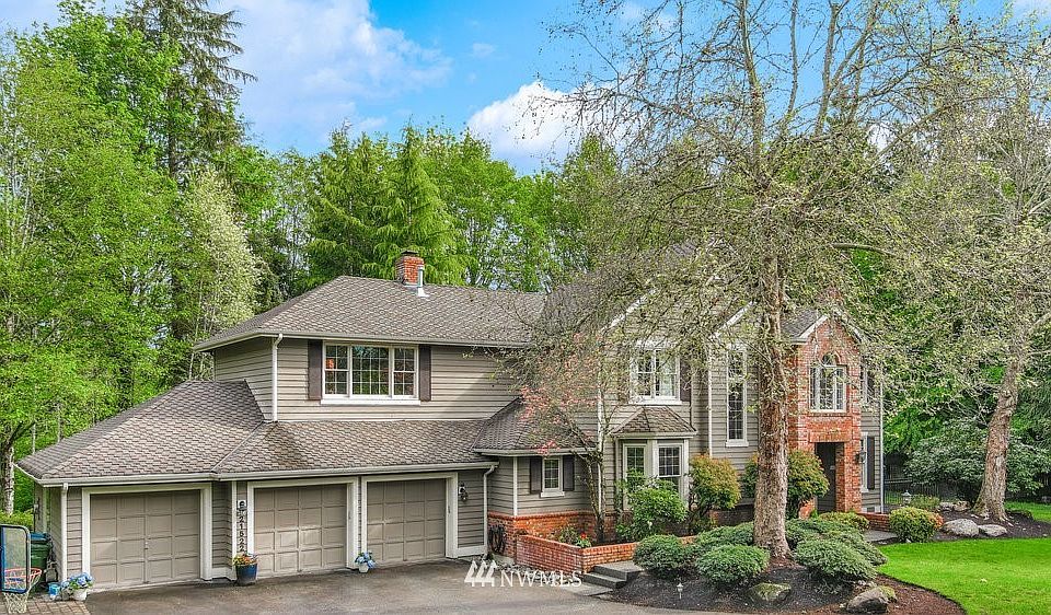 Sought after community of Lake of the Woods located in a quiet cul-de-sac on over an acre of land. >