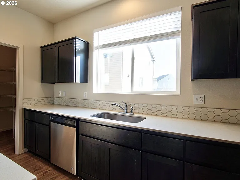 7751 NW Spirea St — Photo 28