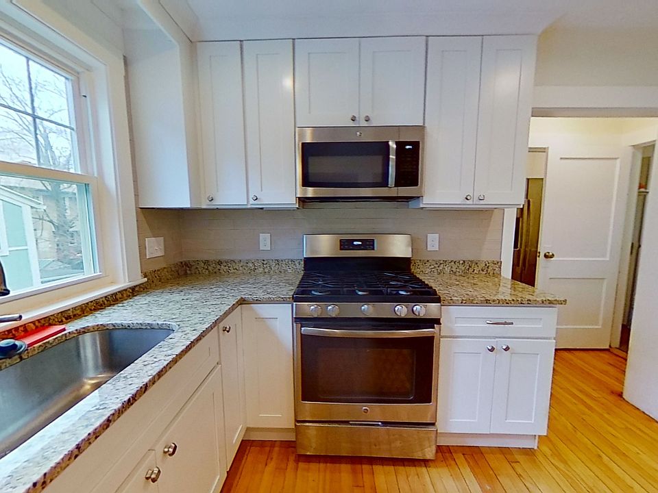 Range and microwave, shows back entrance at right