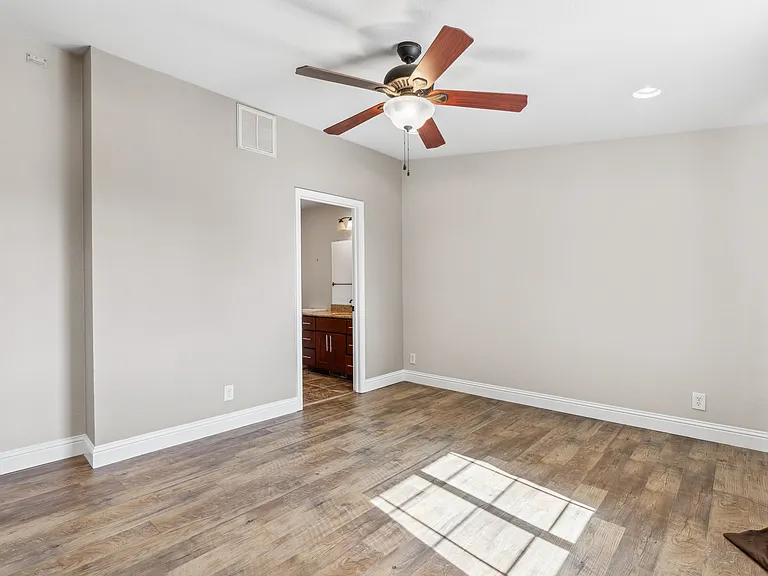 Living room; 1/2 bath in background