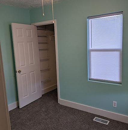 Smaller downstairs bedroom + closet
