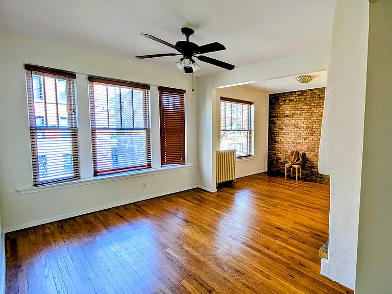 Living room. Windows to Pine Grove Ave