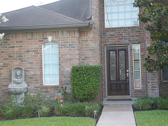 Beautiful landscaping, fountain & great curb appeal at center of cul de sac.