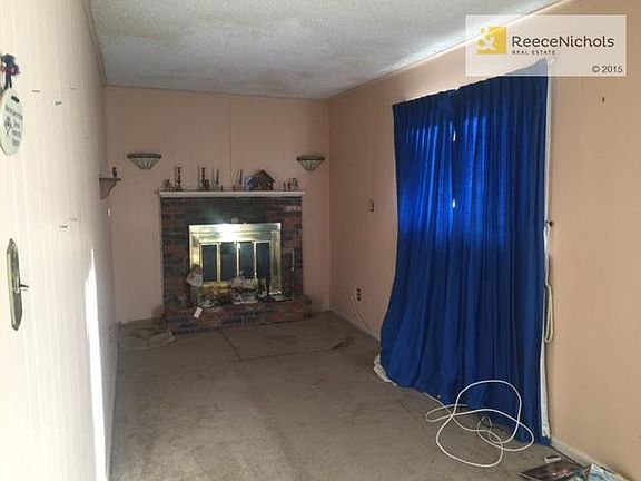 Family room with fireplace.