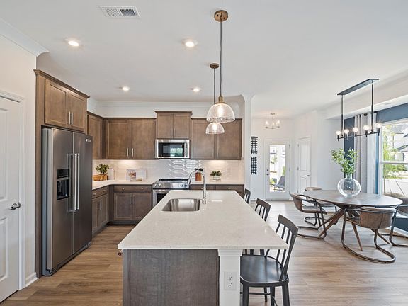 Open Kitchen with Island and Dining Area