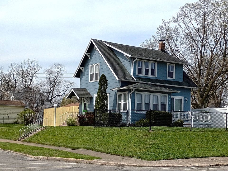 Freshly painted exterior with new black chain_link and wood privacy fencing. Elevated corner lot with no neighbors on either side or behind.