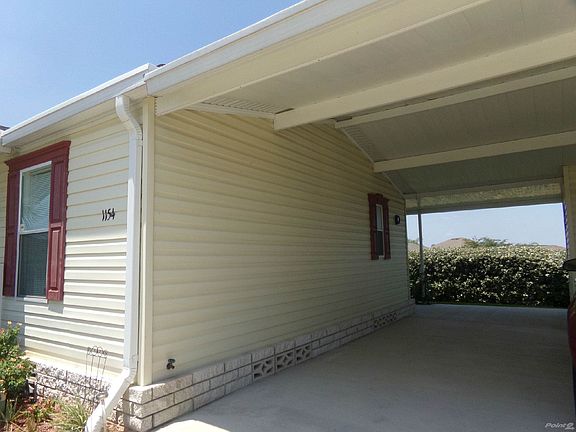 DOUBLE DRIVEWAY WITH CARPORT
