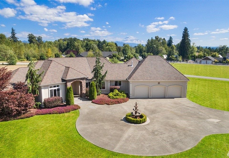 Custom rambler on 2.74 acres with stunning Mt Rainier view!