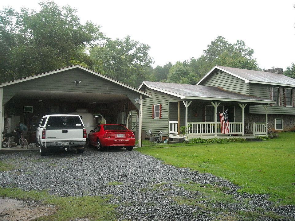Front view of house/ carport   