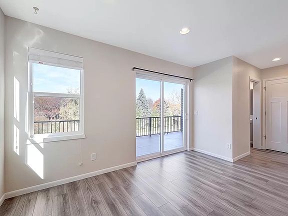 Dining area with porch walkout (1/2 bath, storage, laundry room all to right)
