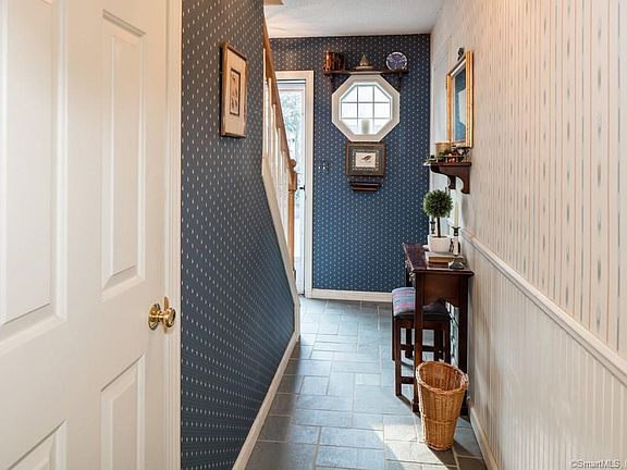Slate floors and octagonal window, add charm to this lovely 2 bedroom Westville condominium.