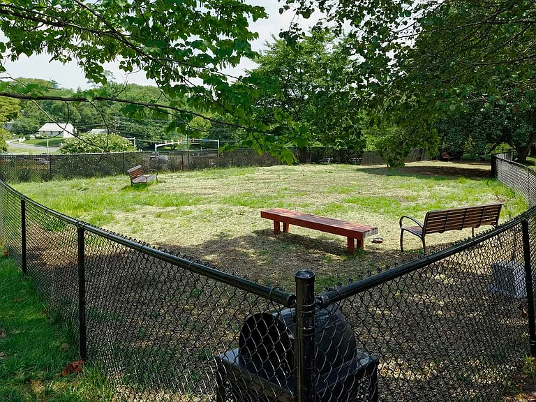 Enclosed pet relief area