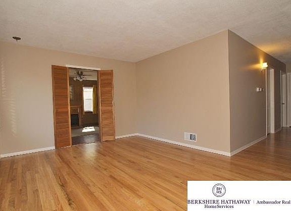 Looking toward family room addition with fireplace added in 1960's.