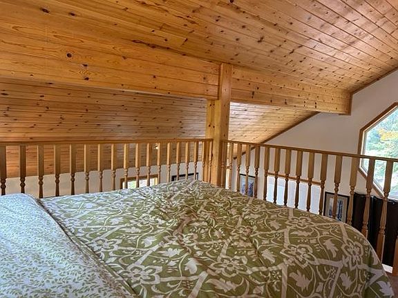 Queen bed in loft