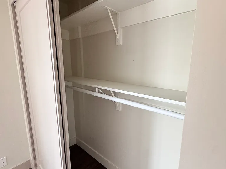 Comfortable third bedroom ideal for guests, kids, or a home office.