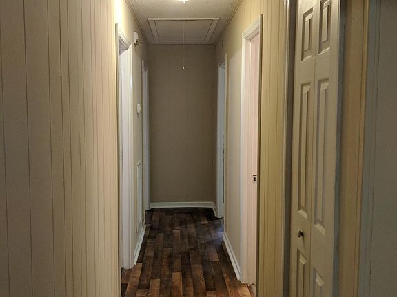 Hall w/ enclosed laundry