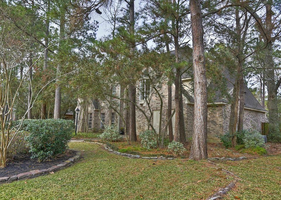 Mature landscaping and gorgeous woodland trees.