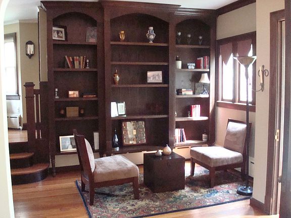 Gorgeous 14x15 foyer with built in bookcases upon entry