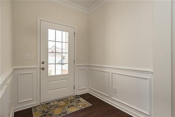 MODEL HOME PICTURED- Nice Wide Foyer with Chair Rail & Wainscoting Included!