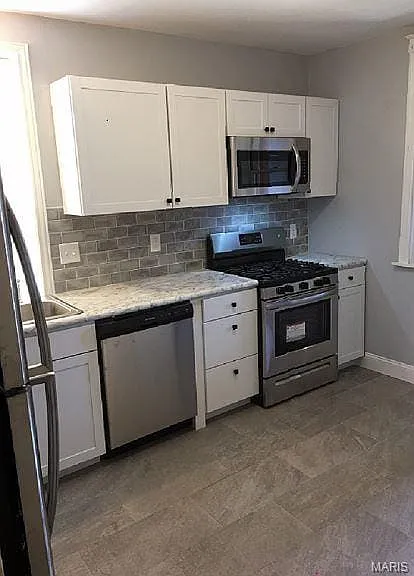 4947 Tholozan Ave — Photo 6