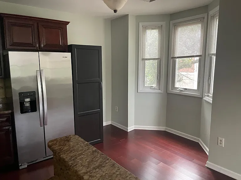 Bay window in kitchen allows natural light to cascade into the unit all day.