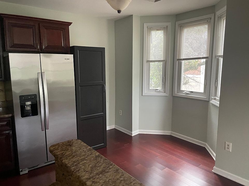 Bay window in kitchen allows natural light to cascade into the unit all day.