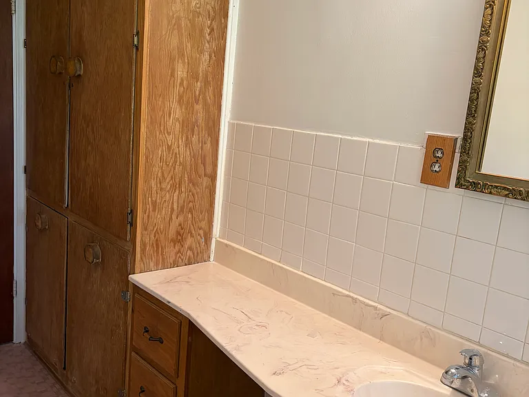 Master bathroom with huge storage cabinet