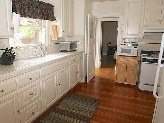 Kitchen includes Bosch dishwasher, gas stove & refrigerator