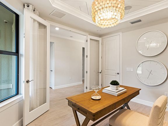 Enclosed flex room located at the front of the home