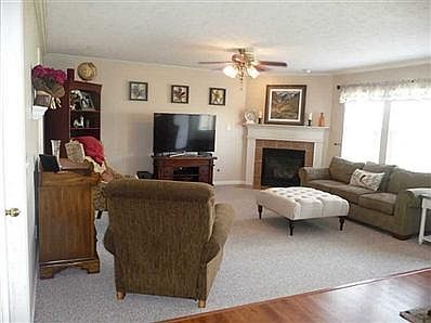 Living Room. Living room off of the kitchen is gorgeous with gas fireplace for those cozy winter nights