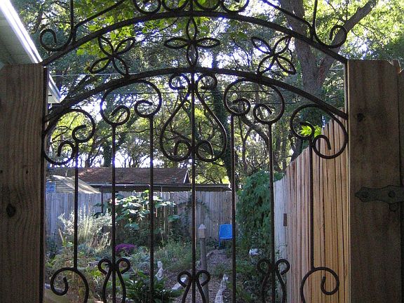 through gate into back garden