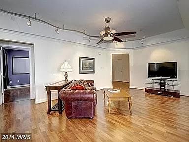 Great room looking at Bedroom 2 on left and entry on right