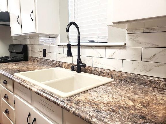 New tile backsplash in kitchen