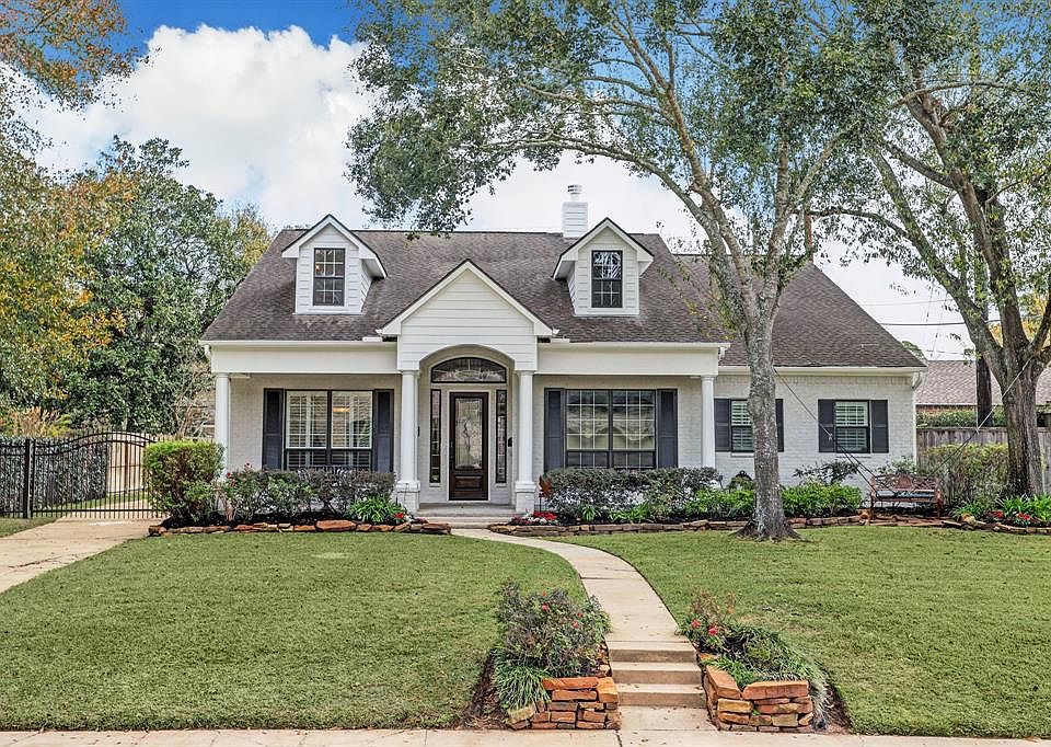 [Front Elevation]This stunning residence is located in Memorial Forest near Frostwood Elementary School and the Memorial Forest Club. Surrounded by professionally landscaped gardens, this home was extensively renovated and upgraded in 2021-2022.