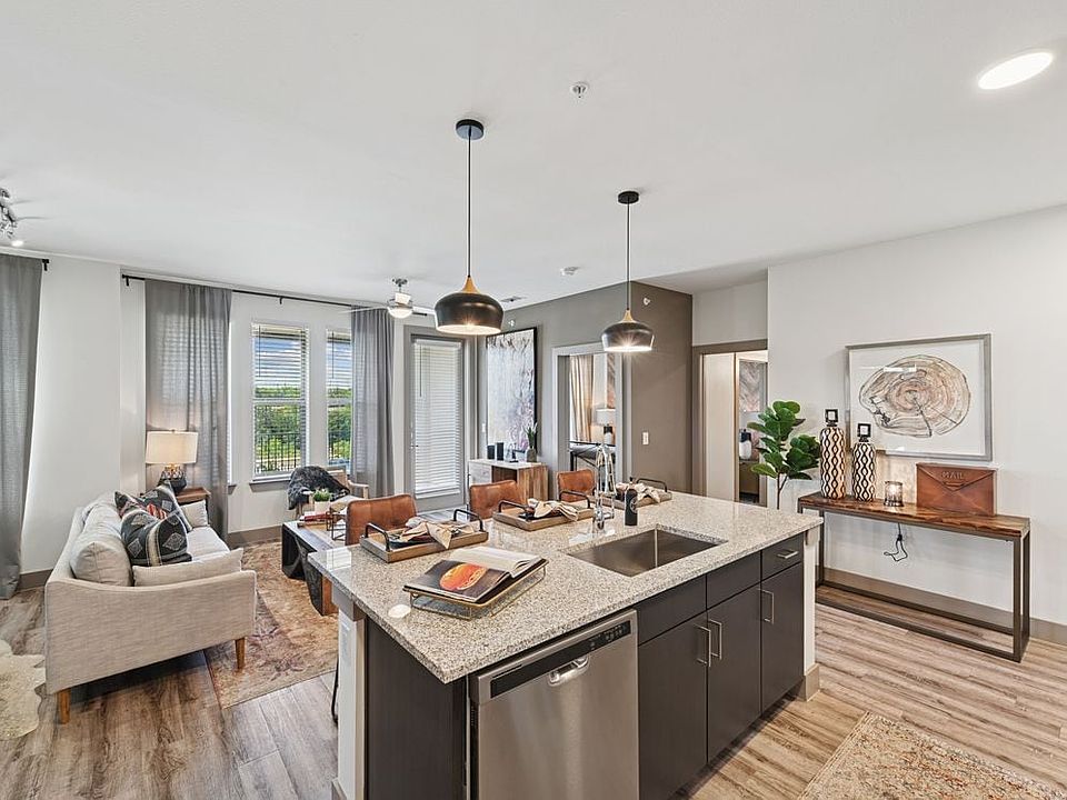 Kitchen and living room with hard surface flooring