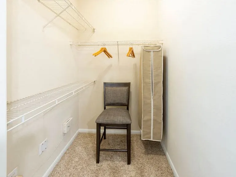 Estancia Model Guest Closet