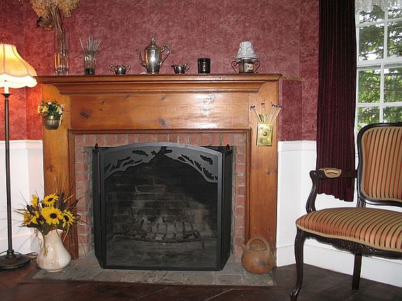 One of the fireplaces in the house, located in the dining room