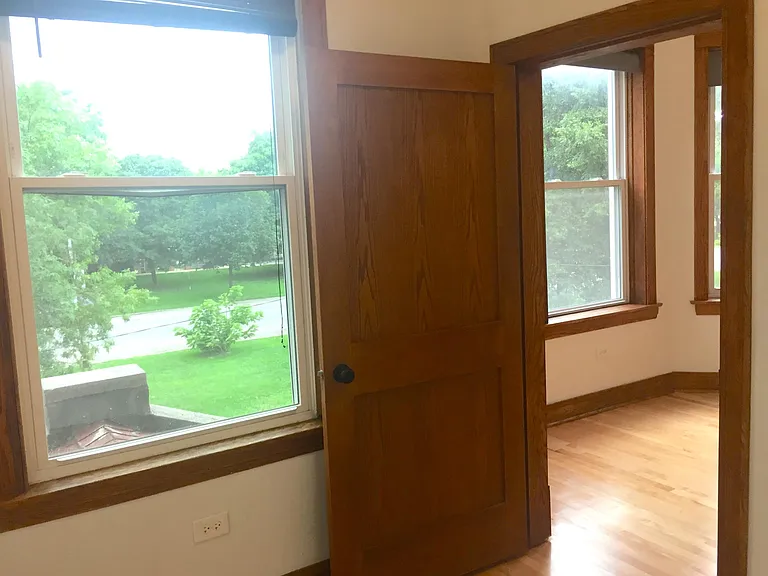 Front bedroom overlooks the boulevard and gets morning light.
