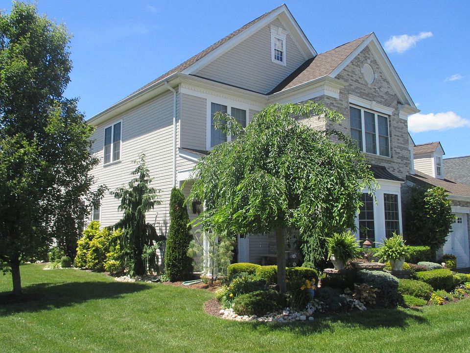Oversized Corner Property with Lush Landscaping