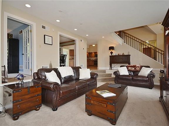 Another view of the living room highlights the breezy, open floor plan.