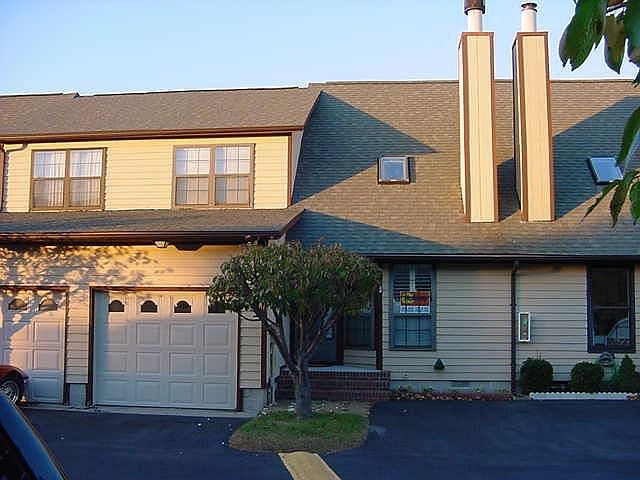Front of Townhouse, two parking spaces in front of house and