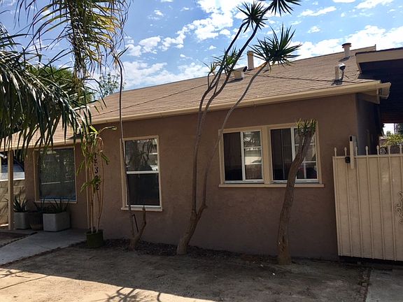 Side of house, carport gate