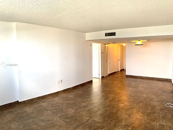 3rd image of 4675 W 18th Ct APT 306-G