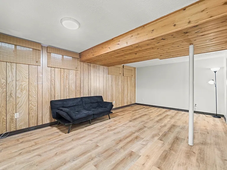 Spacious finished basement with a full bathroom and versatile bonus room, perfect for a guest suite, home office, gym, media room, or additional living space.